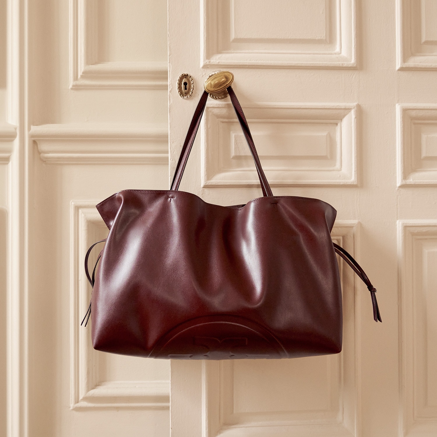 Shop the Romy Top Handle bag