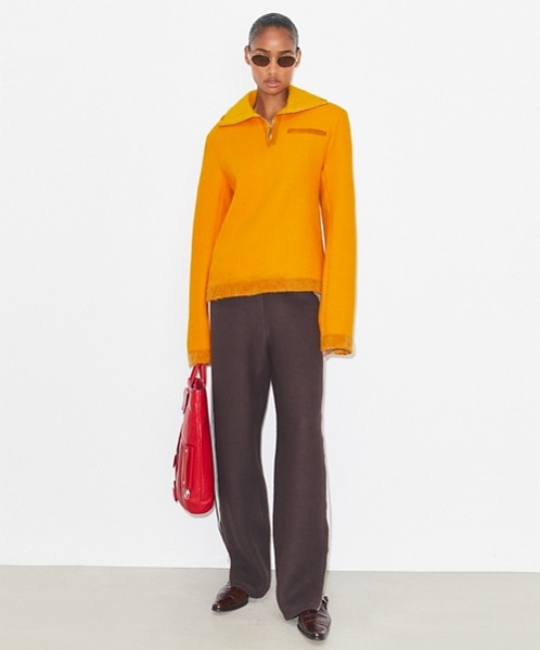 Shop the orange sweater