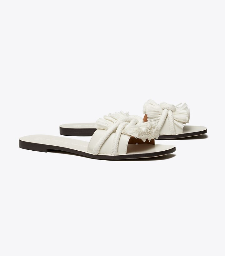 white designer flip flops