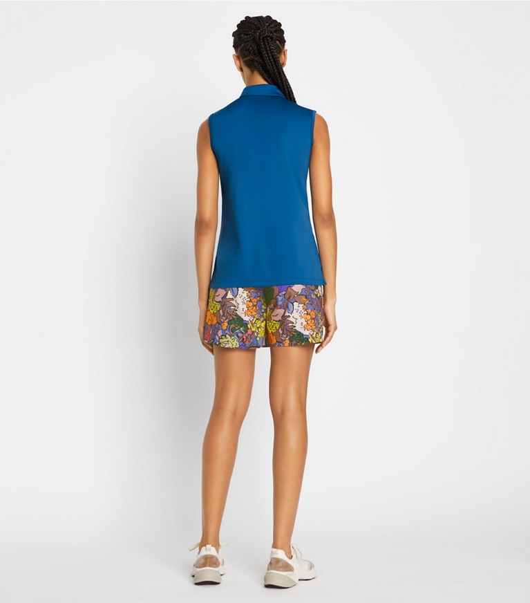 Tory Sport designer oberteile Ärmelloses Polo aus Funktionspiqué mit Rüschen in Blue Wash / Snow White front