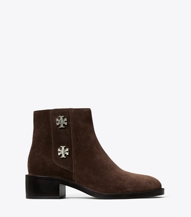 Tory Burch designer ブーティ ターンロック アンクルブーツ dans DARK COCOA de côté