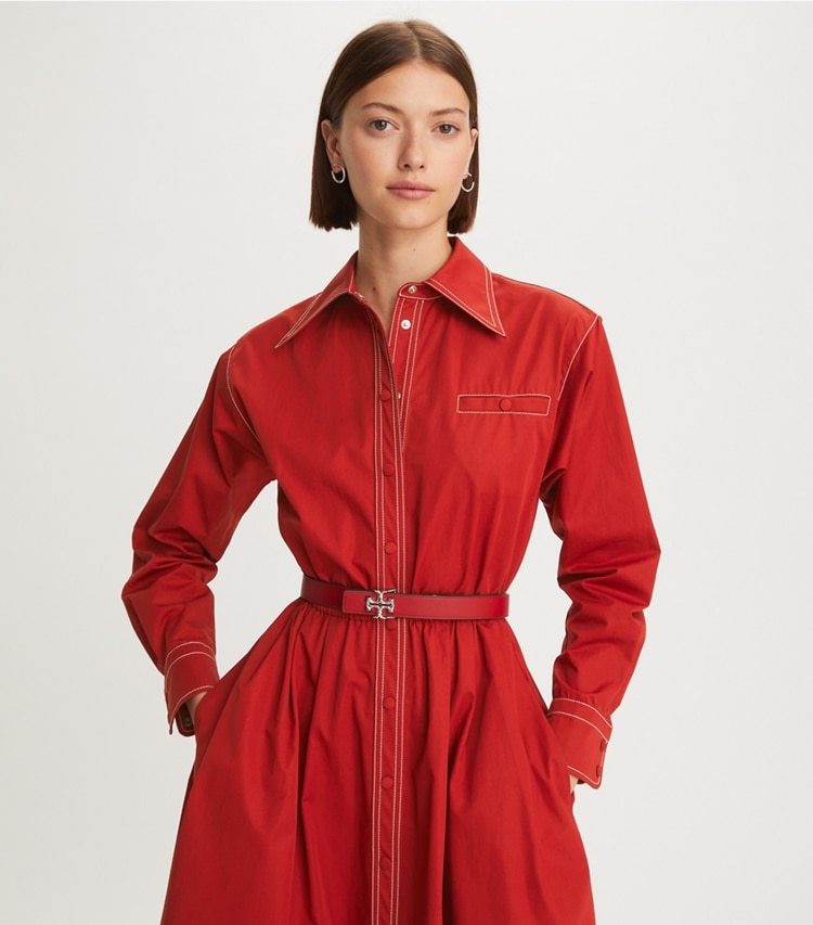 Tory Burch designer belts 1" Eleanor Reversible Belt in TORY RED / Tory Navy / Silver accessory on model