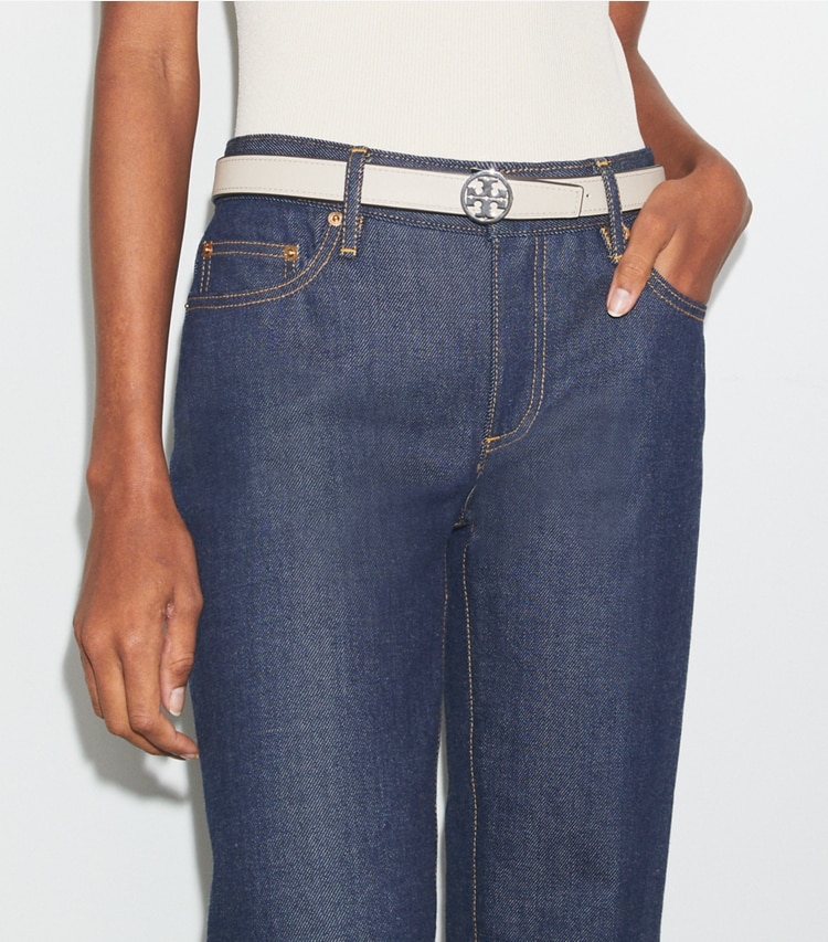 Tory Burch designer belts 1" Miller Reversible Belt in Warm White / Tortora / Silver accessory on model