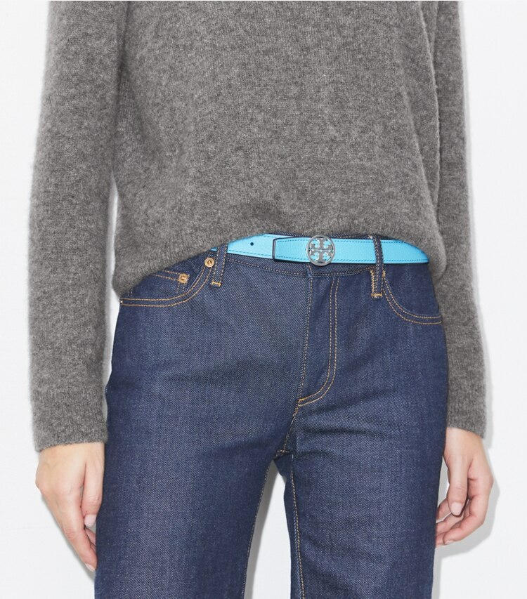 Tory Burch designer belts 1" Miller Reversible Belt in Soft Turquoise / John Coco / Silver accessory on model