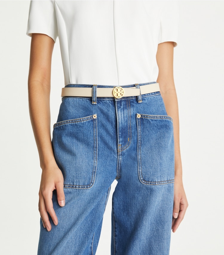 Tory Burch designer belts 1" Miller Smooth Reversible Belt in Tory Navy / Moose / Gold accessory on model