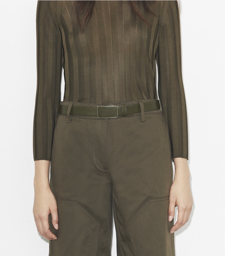 Tory Burch designer belts 1.5" Plate Belt in Dark Olive accessory on model