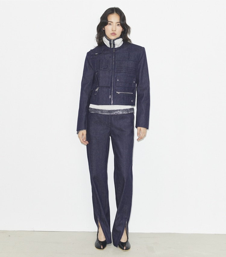 Tory Burch designer bottoms Ankle-Zip Cotton Jeans in Raw/Unwashed on model front
