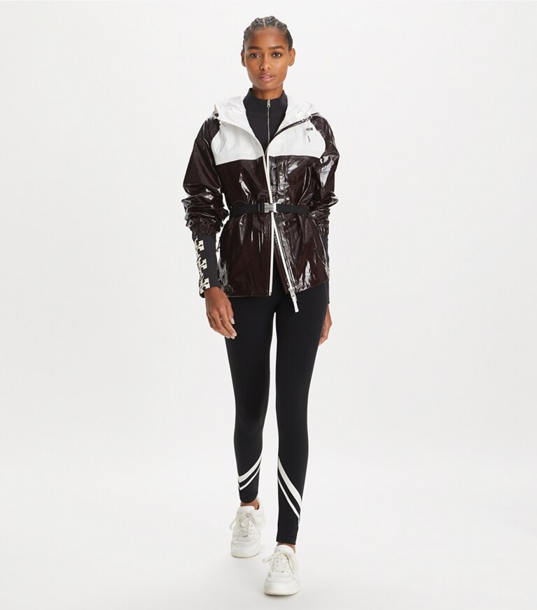 Tory Sport designer vestes Anorak à capuche zippé en coton in Winetasting / Snow White front