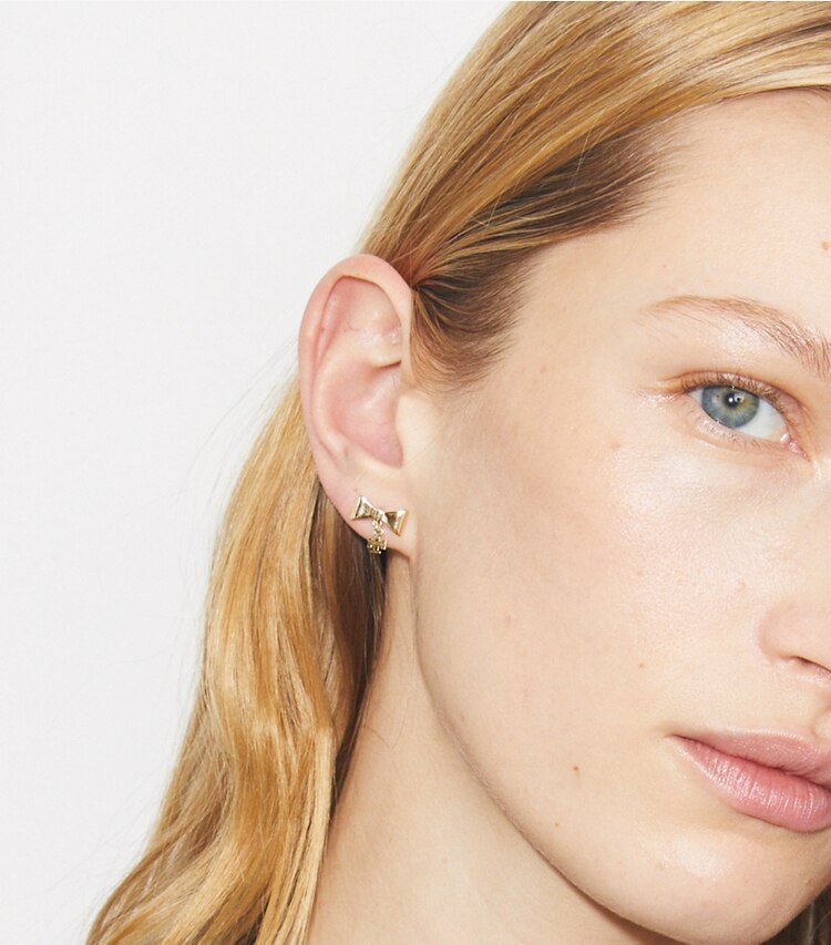 Tory Burch diseñador aretes Aros con moño Curiosity en Tory Gold accesorio en modelo