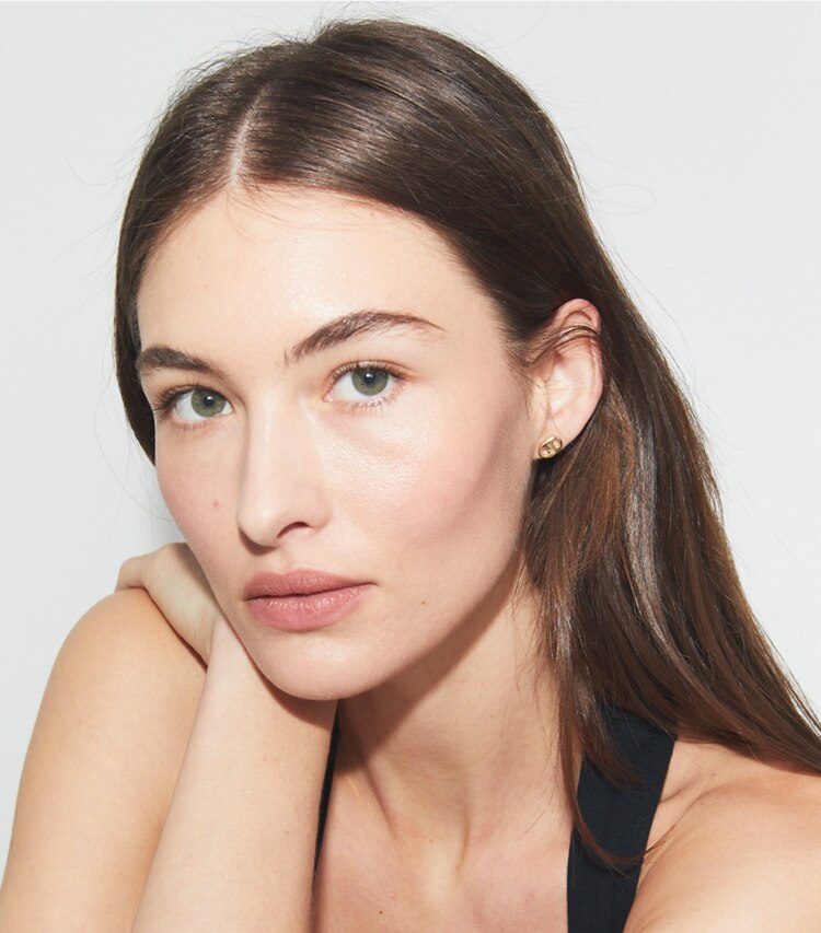 Tory Burch diseñador aretes Aros de botón Gemini en Light Brass accesorio en modelo