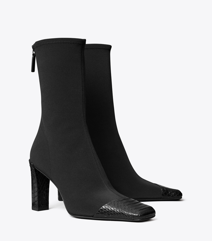 Tory Burch designer ankle boots Asymmetric Cap-Toe Boot in PERFECT BLACK angle