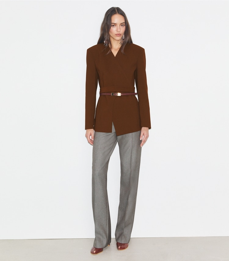 Tory Burch designer jackets Asymmetrical Pique Wrap Jacket in Spiced Mocha on model front