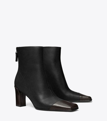 Tory Burch designer stiefeletten Asymmetrische Stiefelette mit Zehenkappe in PERFECT BLACK / COCO angle