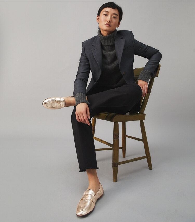 Tory Burch designer flats Ballet Loafer in Spark Gold accessory on model