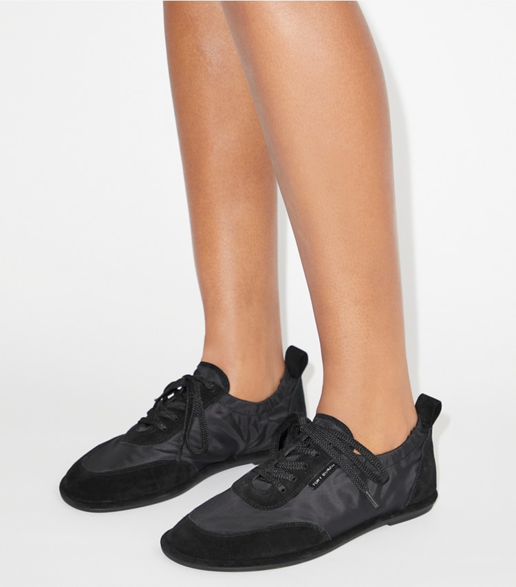 Tory Burch designer sneakers Ballet Sneaker in PERFECT BLACK accessory on model