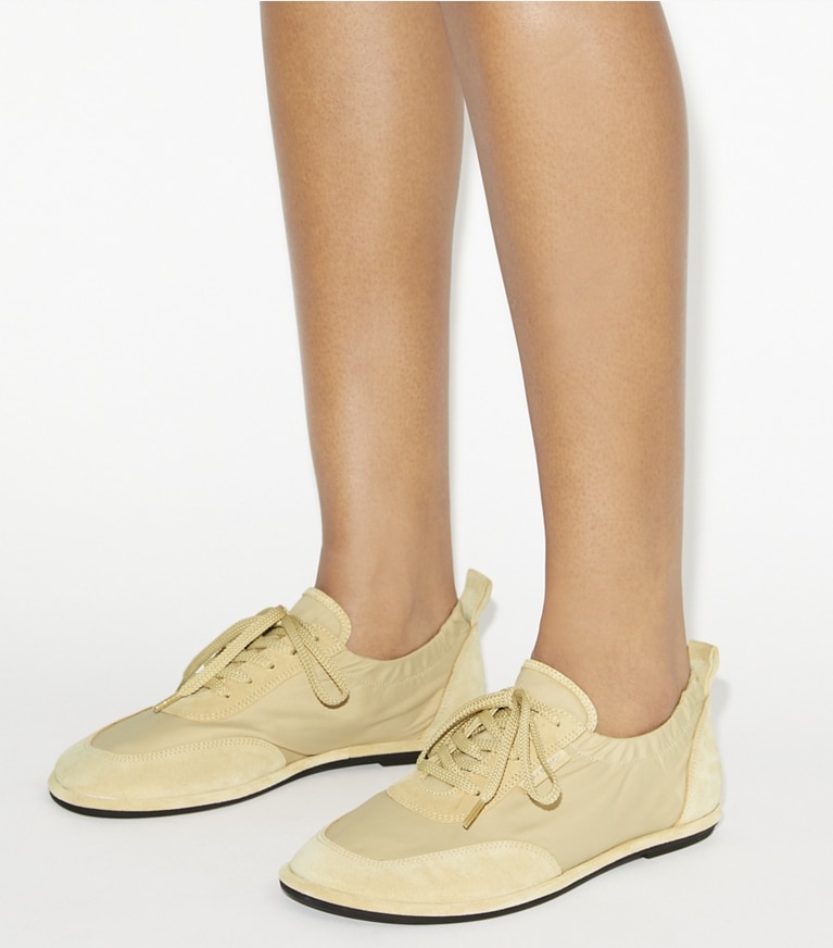 Tory Burch designer sneakers Ballet Sneaker in LIGHT DUNE / PRALINE angle