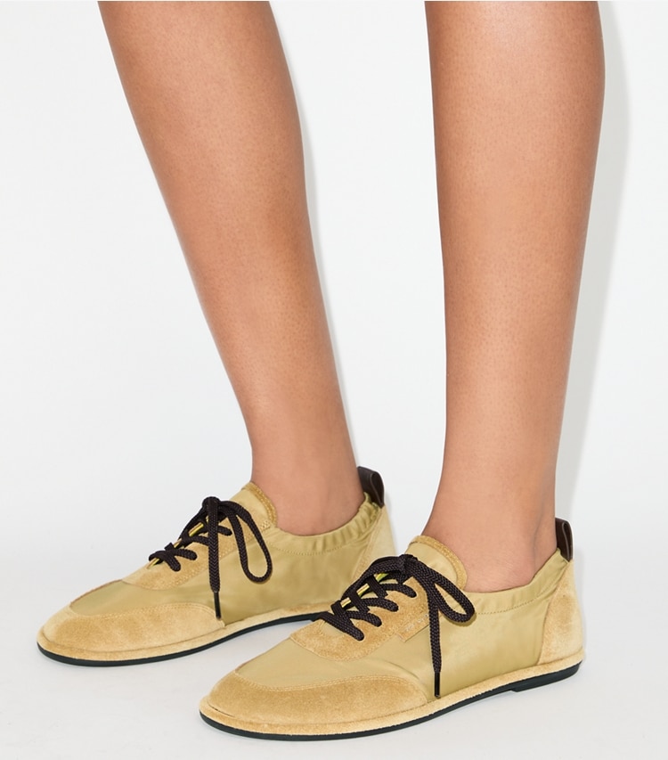 Tory Burch designer sneakers Ballet Sneaker in SUMMER WHEAT / SUMMER WHEAT accessory on model