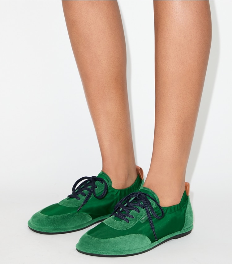 Tory Burch designer sneakers Ballet Sneaker in SWEET BASIL / SWEET BASIL accessory on model