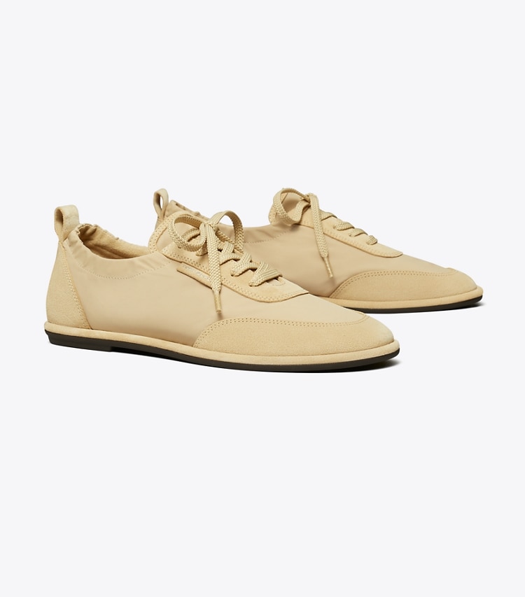 Tory Burch designer sneakers Ballet Sneaker in LIGHT DUNE / PRALINE angle