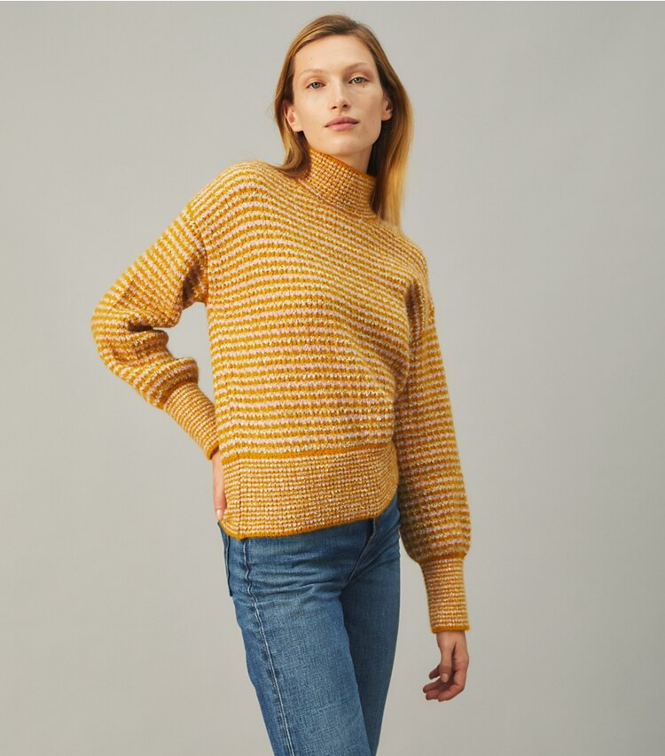 Tory Burch designer sweaters Balloon Sleeve Turtleneck Sweater in Gold Sun on model detail