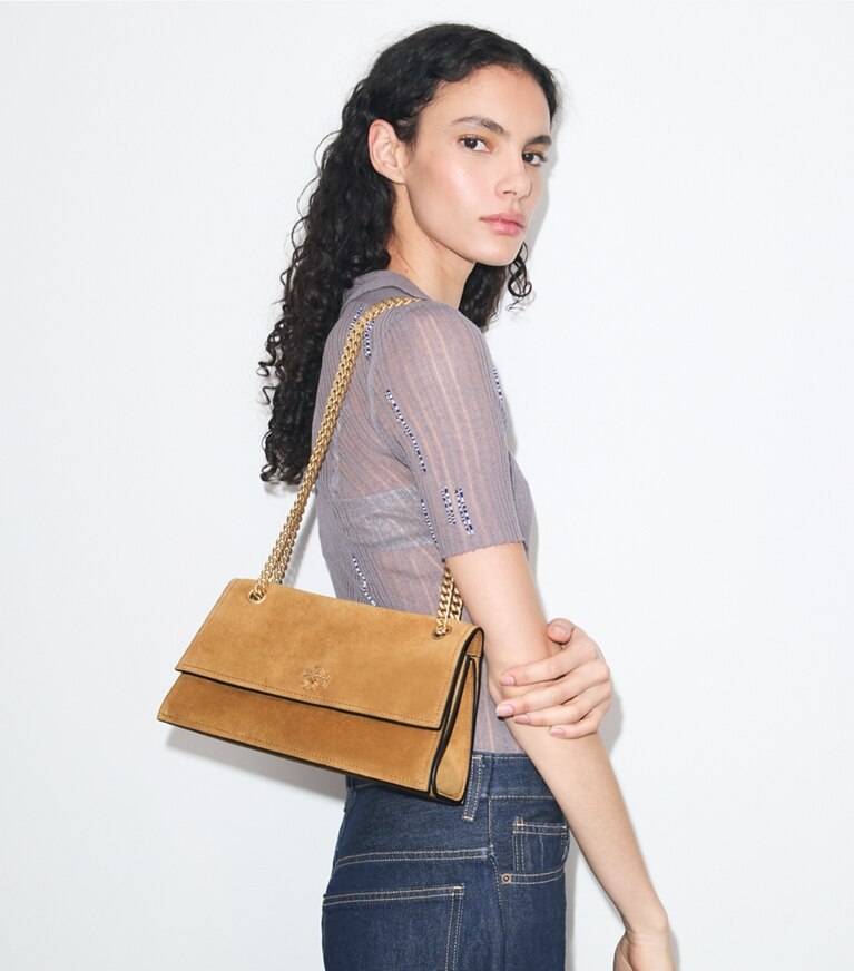 Tory Burch diseñador bolsos de hombro Bandolera de gamuza con broche giratorio Kira en Toffee accesorio en modelo