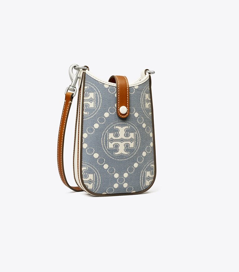 Tory Burch diseñador minibolsos Bandolera para teléfono de denim con monograma de T en Pearl Blue ángulo