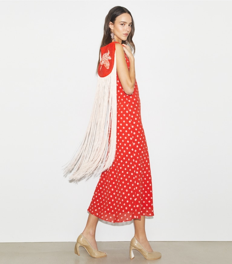 Tory Burch designer tote bags Beaded Fringe Wristlet in Pepperoncini accessory on model