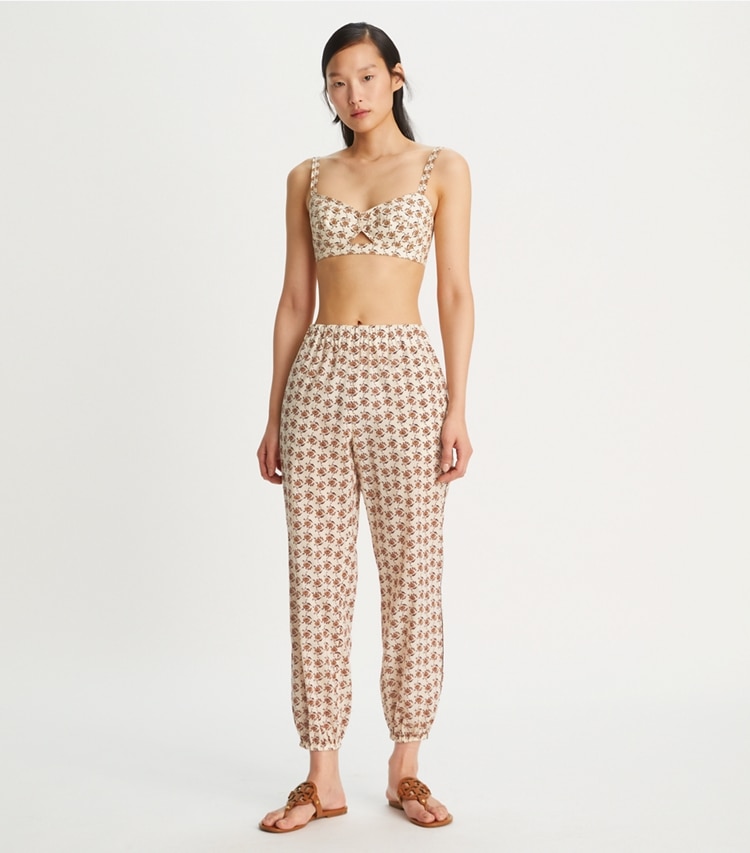 Tory Burch designer strandmode Bedruckte Strandhose in Curly Ditsy Logo modell von vorn