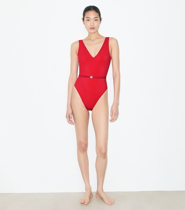 Tory Burch designer one pieces Belted Swimsuit in Bright Red on model front