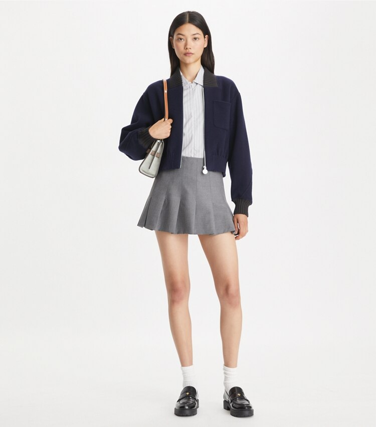 Tory Burch designer vestes Blouson aviateur en laine dans Medium Navy sur modèle, de face
