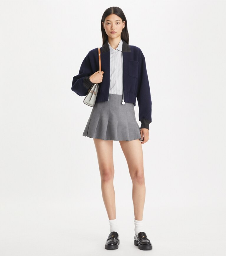 Tory Burch designer vestes Blouson aviateur en laine dans Medium Navy sur modèle, de face