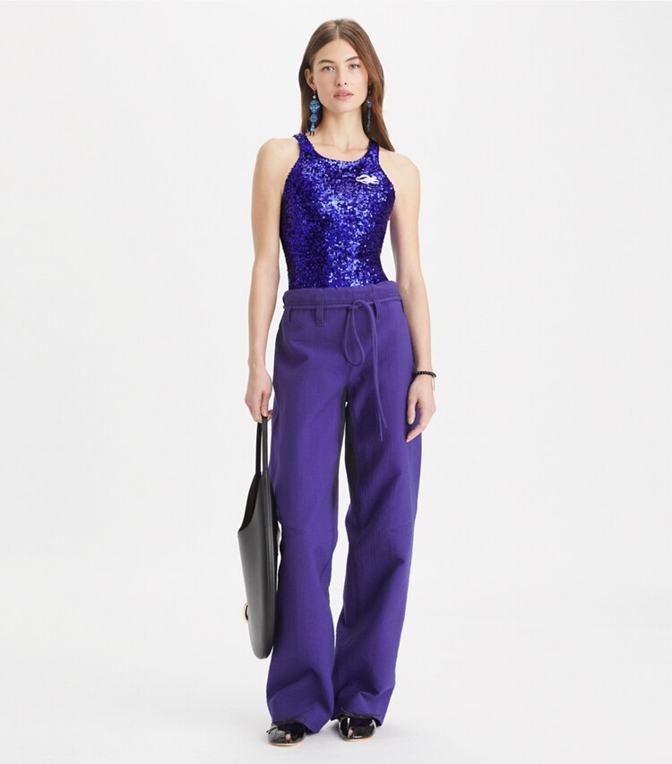 Tory Burch designer hauts Body en jersey à sequins in Ballpoint Blue sur mannequin, devant
