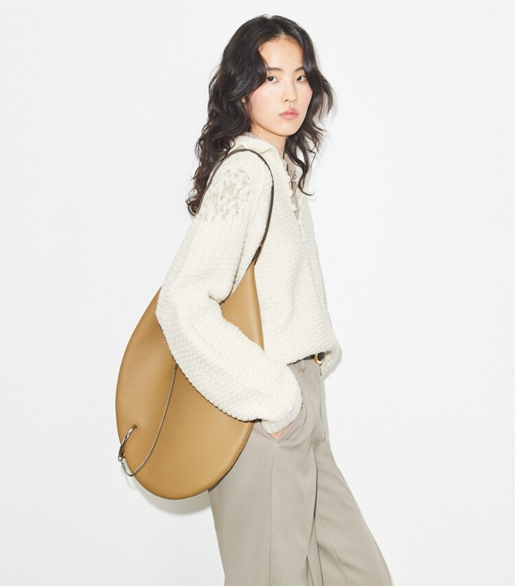 Tory Burch diseñador bolsos de hombro Bolso blando Pierced en Light Sand accesorio en modelo