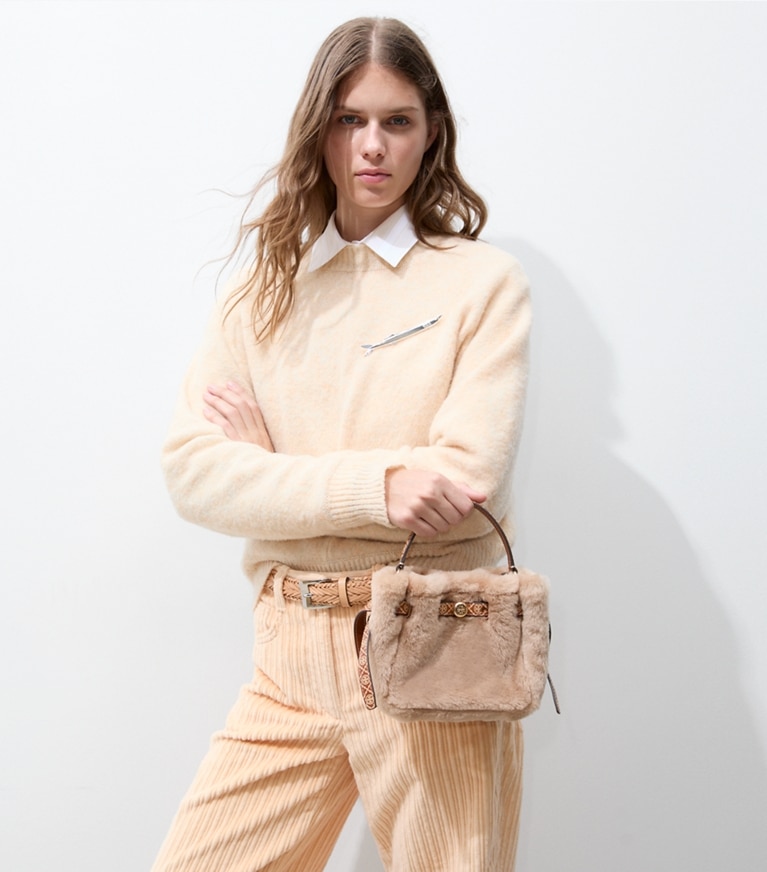 Tory Burch diseñador bolsos bandolera Bolso bucket mini de borreguillo Romy en Teddy accesorio en modelo