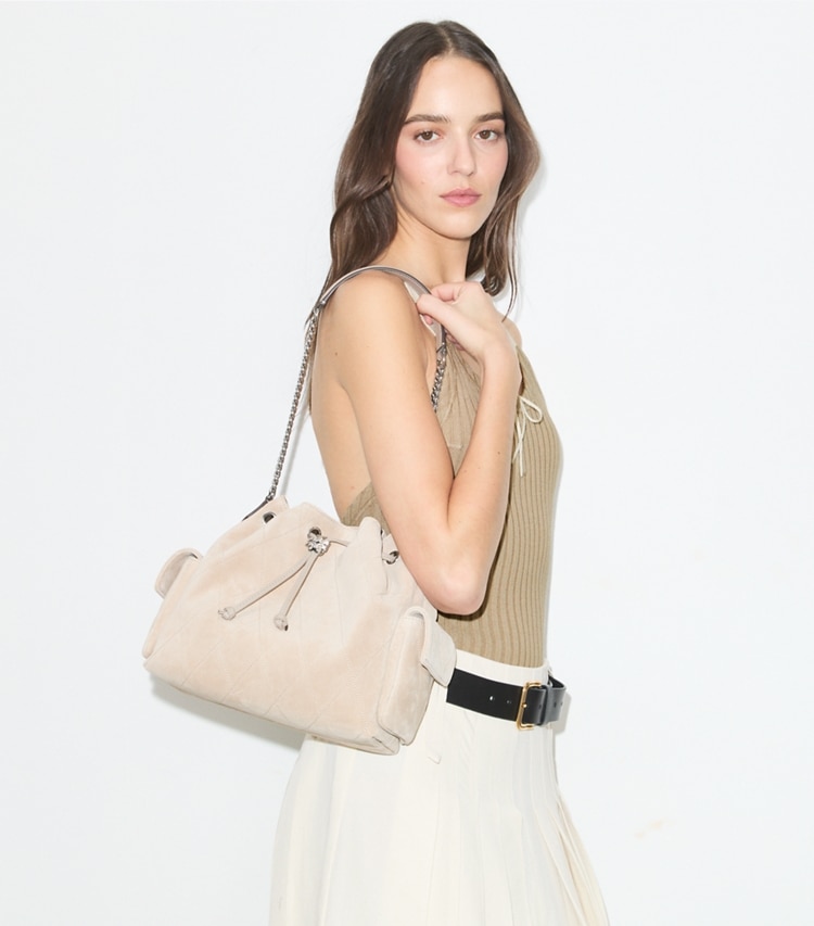 Tory Burch diseñador bolsos de hombro Bolso de hombro de gamuza Charlie acolchado con cordón ajustable en Soft Cement accesorio en modelo
