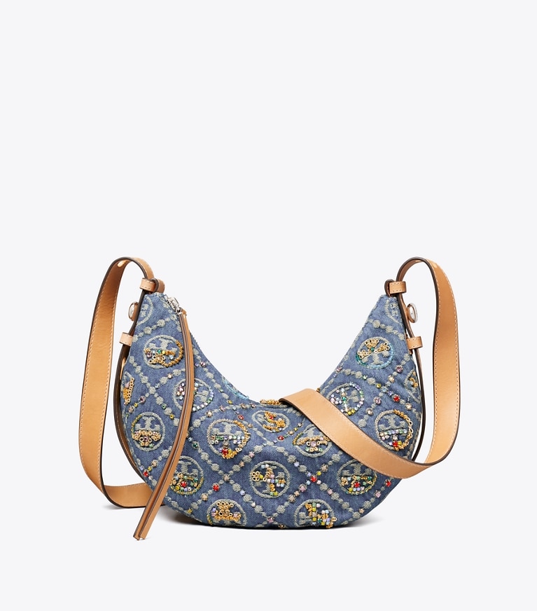 Tory Burch diseñador bolsos de hombro Bolso en media luna Romy, confeccionado en mezclilla con adornos y monograma en forma de T en Deep Royal adicional