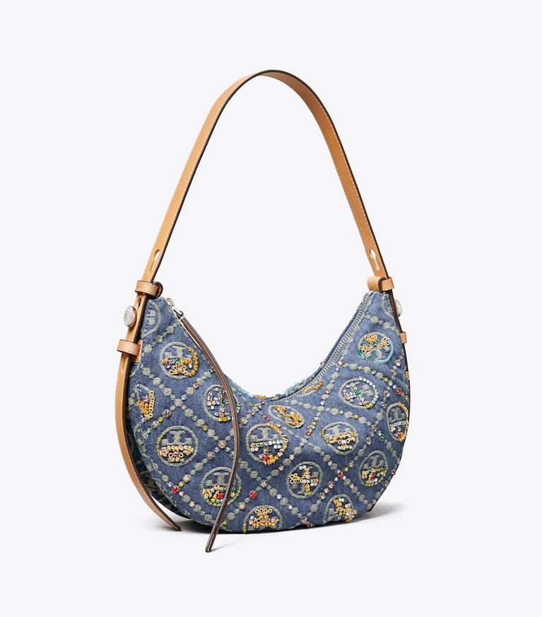 Tory Burch diseñador bolsos de hombro Bolso en media luna Romy, confeccionado en mezclilla con adornos y monograma en forma de T en Deep Royal ángulo