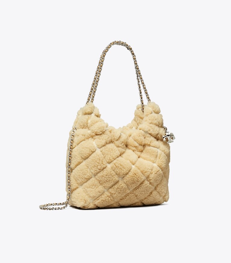 Tory Burch diseñador bolsos bandolera Bolso hobo mini Fleming de borreguillo en Ivory ángulo
