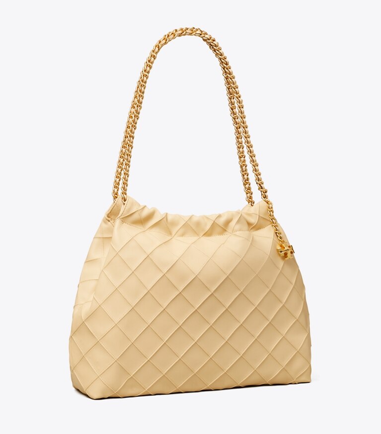 Tory Burch diseñador bolsos hobo Bolso hobo suave Fleming en Vanilla Soft Serve ángulo