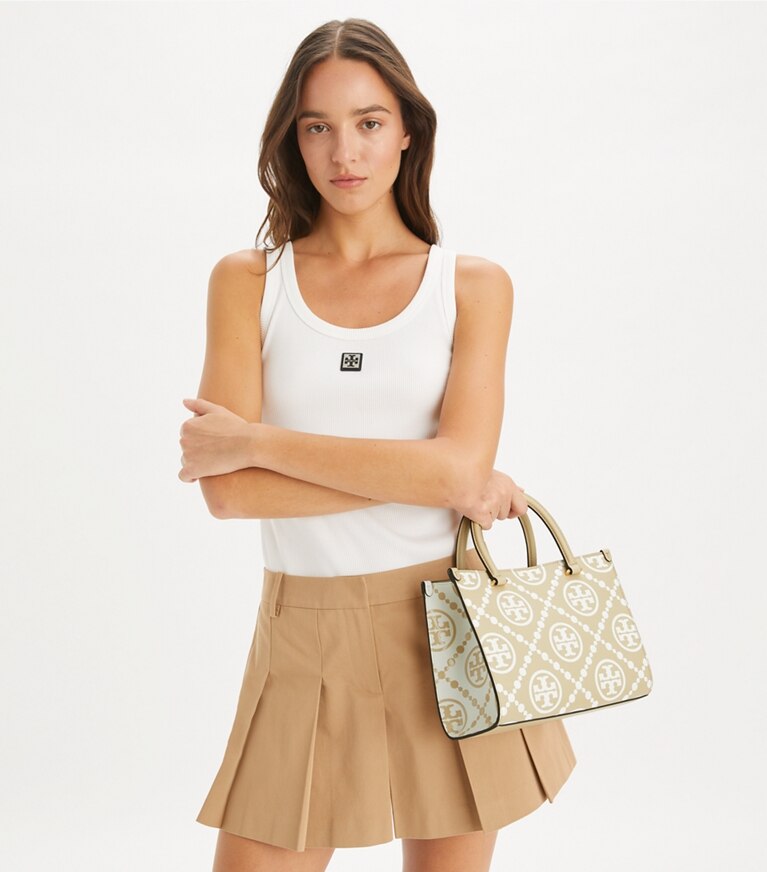 Tory Burch diseñador bolsos tote Bolso tote con asa superior en relieve en contraste con monograma de T en Beige adicional en el modelo