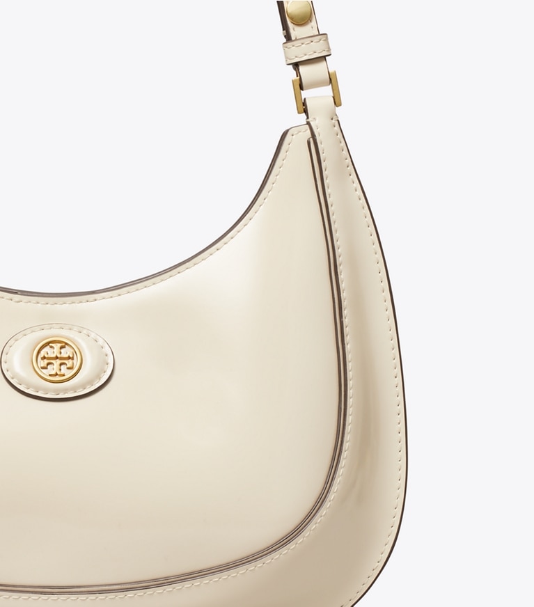 Tory Burch designer borse a tracolla Borsa a mezzaluna Robinson convertibile in pelle spazzolata in SHEA BUTTER angle