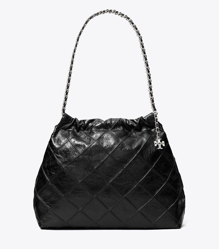 Tory Burch designer borse hobo Borsa hobo Fleming effetto invecchiato in Black angle