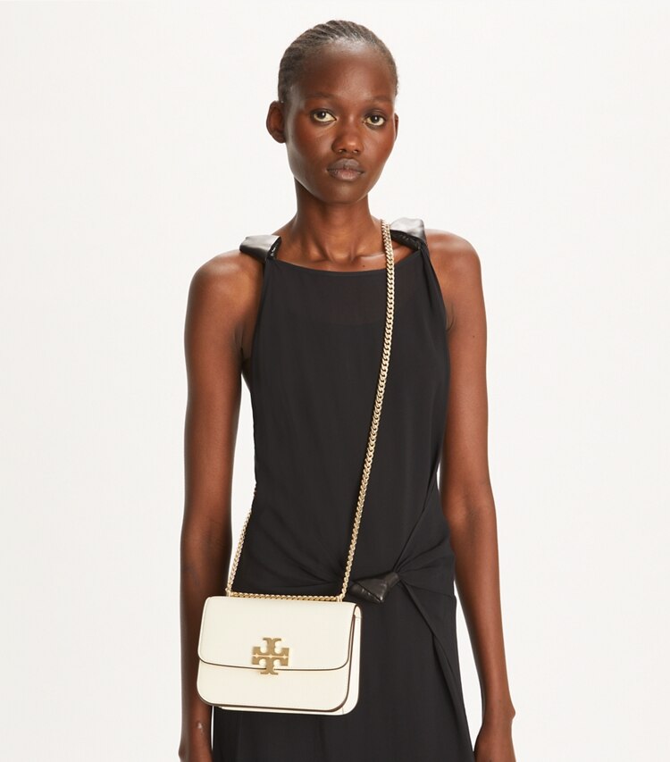 Tory Burch designer borse a tracolla Borsa piccola Eleanor in Warm White additional on model