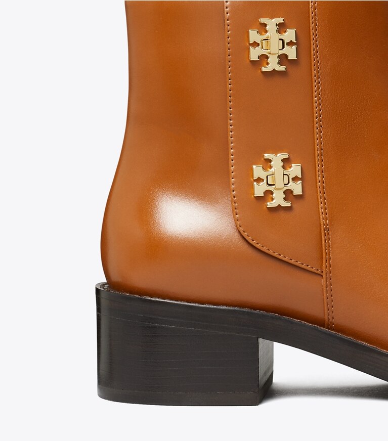 Tory Burch diseñador botines Botín con broche giratorio en SIERRA COGNAC detalle