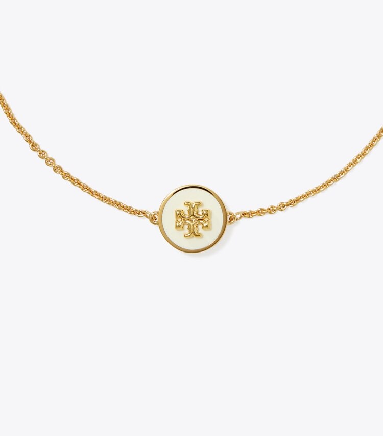 Tory Burch designer bracciali Bracciale a catena Icon smaltato in Tory Gold / New Ivory dettaglio