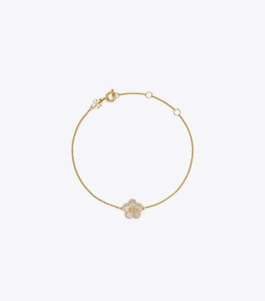 Tory Burch designer bracciali Bracciale con fiore Kira in Tory Gold / Mother of Pearl front