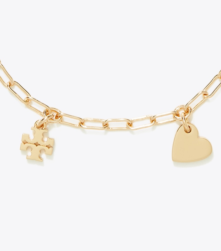 Tory Burch designer bracciali Bracciale Curiosity Heart in Tory Gold dettaglio