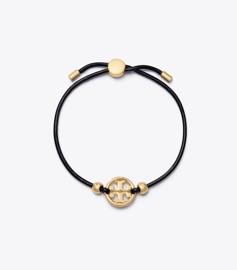 Tory Burch designer bracciali Bracciale Icon con chiusura a scorrimento in Tory Gold / Black front