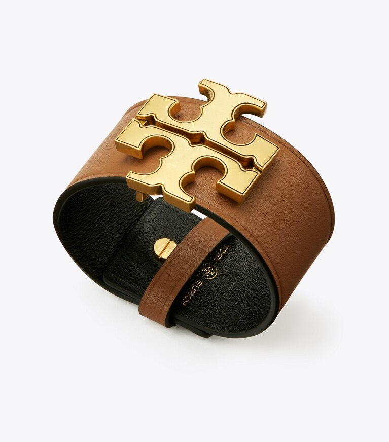 Tory Burch designer bracciali Bracciale in pelle Eleanor in Rolled Brass / Classic Cuoio front