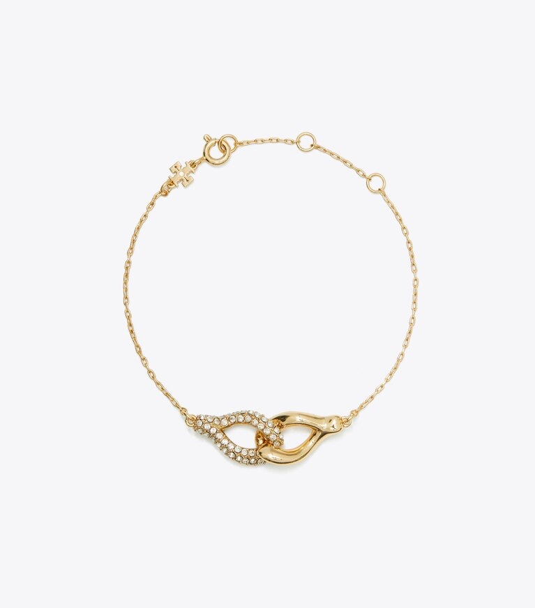 Tory Burch designer bracciali Bracciale intrecciato portafortuna in Tory Gold / Crystal front
